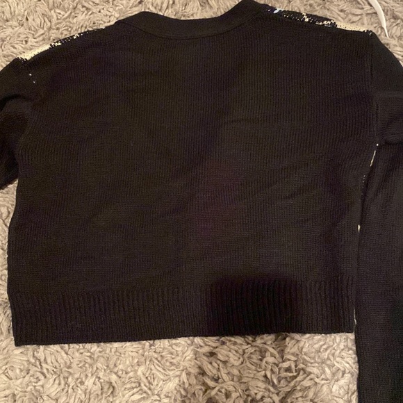 Never worn in great condition. No holes or rips - Picture 2 of 3